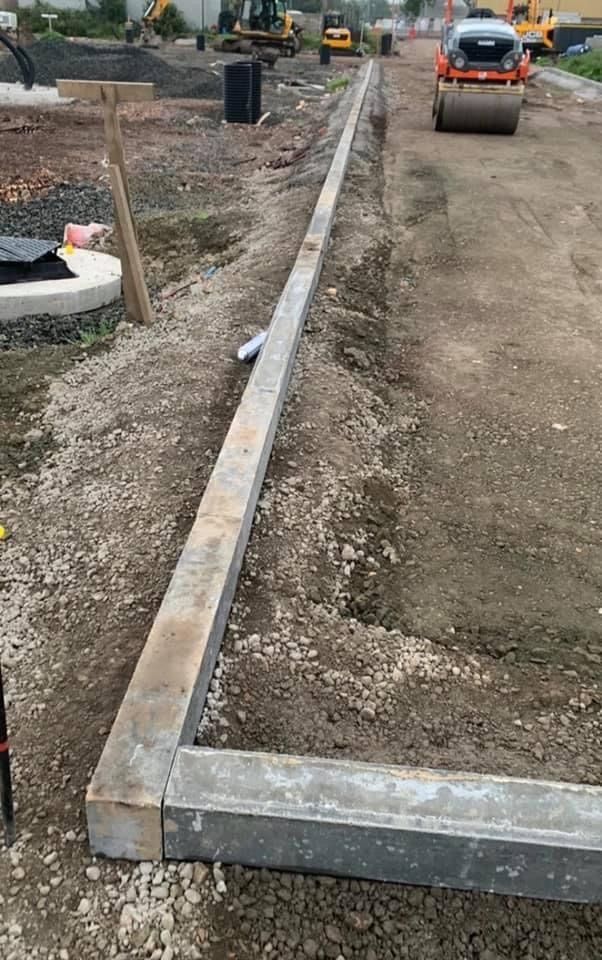 New concrete kerb line formed at a commercial site in Stirling
