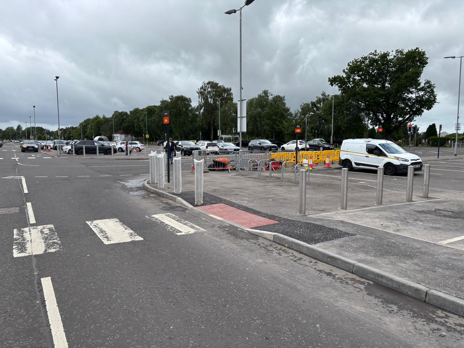 Completed bollard and tactile paving installation at a retail park in Bishopbriggs