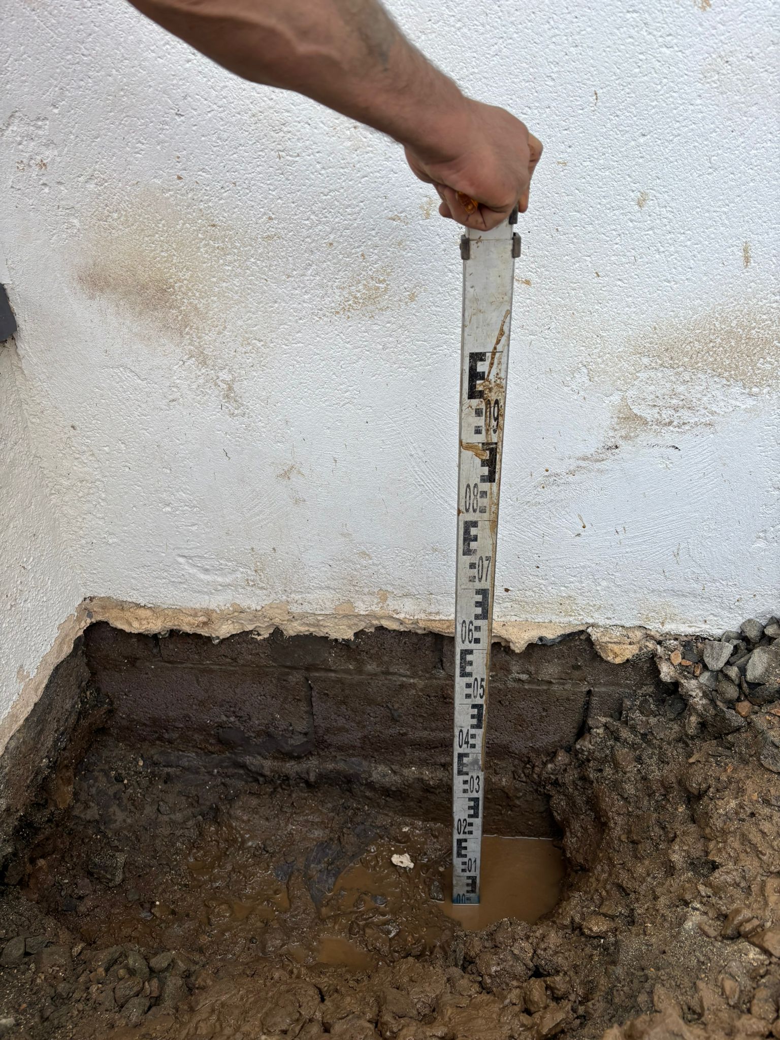 Trial dig excavated to expose foundation