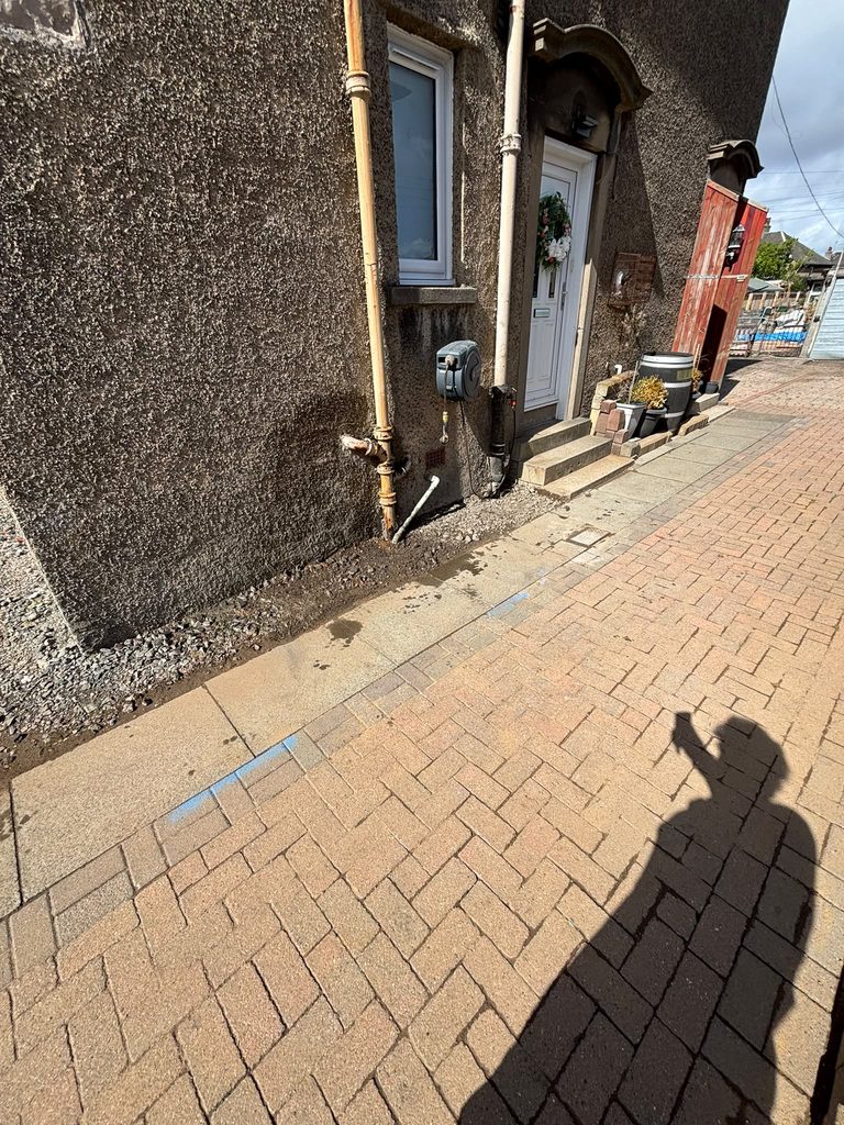 Block paving reinstatement after drain repair in Falkirk